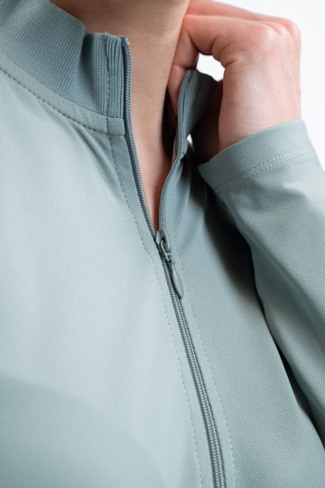 Polo técnico Tess Mujer - Gris Verde Polo técnico Tess Mujer - Gris Verde